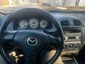 Mazda 323 2002 года за 1 600 000 тг. в Алматы – фото 6