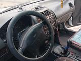 Mitsubishi Carisma 1997 года за 650 000 тг. в Алматы – фото 3