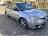 Mitsubishi Lancer 2003 годаүшін1 200 000 тг. в Жезказган – фото 3