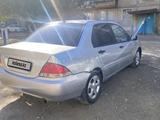 Mitsubishi Lancer 2003 годаүшін1 200 000 тг. в Жезказган – фото 4