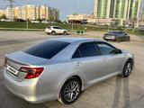 Toyota Camry 2013 года за 6 250 000 тг. в Актобе – фото 4