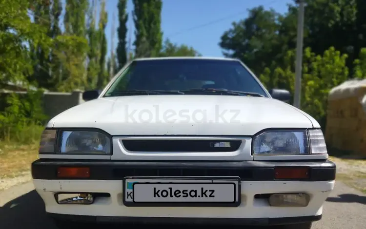 Mazda 323 1990 годаүшін1 300 000 тг. в Ленгер