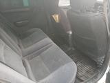 Toyota Carina E 1995 года за 1 800 000 тг. в Иргели – фото 5
