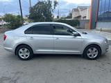 Skoda Rapid 2015 года за 5 200 000 тг. в Актобе – фото 2