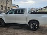 Toyota Hilux 2022 года за 28 000 000 тг. в Алматы – фото 4