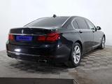 BMW 750 2014 года за 8 950 000 тг. в Астана – фото 5