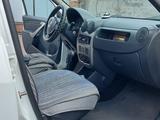 Renault Logan 2015 года за 3 500 000 тг. в Караганда – фото 4