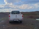 Mitsubishi L200 2007 года за 5 114 444 тг. в Астана – фото 4