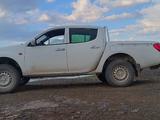 Mitsubishi L200 2007 года за 5 114 444 тг. в Астана – фото 5