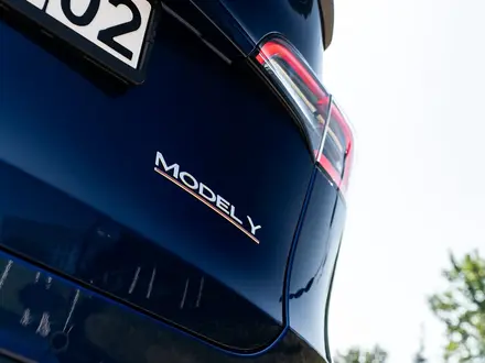 Tesla Model Y 2023 года за 19 000 000 тг. в Алматы – фото 13