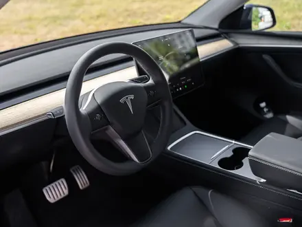 Tesla Model Y 2023 года за 19 000 000 тг. в Алматы – фото 27