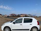 Renault Sandero 2013 года за 3 000 000 тг. в Атырау
