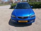 Mazda 323 2001 года за 3 000 000 тг. в Актау – фото 4
