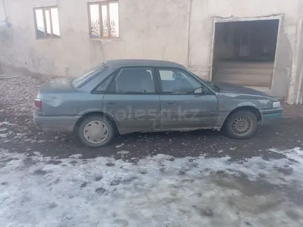 Mazda 626 1991 года за 350 000 тг. в Мерке – фото 4