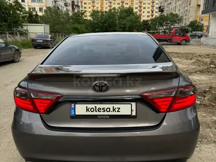 Toyota Camry 2015 года за 6 500 000 тг. в Кульсары – фото 13