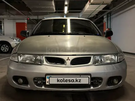 Mitsubishi Carisma 1996 года за 980 000 тг. в Алматы – фото 2