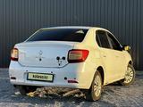 Renault Logan 2014 года за 2 690 000 тг. в Актобе – фото 4