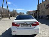 Toyota Camry 2014 года за 9 500 000 тг. в Актобе – фото 3