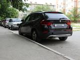 BMW X1 2014 года за 8 000 000 тг. в Атырау – фото 2