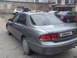 Mazda 626 1993 года за 1 400 000 тг. в Астана – фото 2