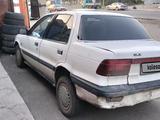 Mitsubishi Lancer 1990 года за 600 000 тг. в Есик – фото 4