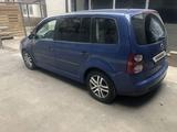 Volkswagen Touran 2008 года за 2 800 000 тг. в Алматы