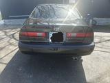 Toyota Camry 1999 года за 3 500 000 тг. в Шымкент – фото 2