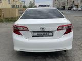 Toyota Camry 2014 года за 7 400 000 тг. в Атырау – фото 4